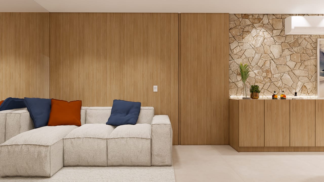 Sala de estar com parede em pedra natural e painel de madeira